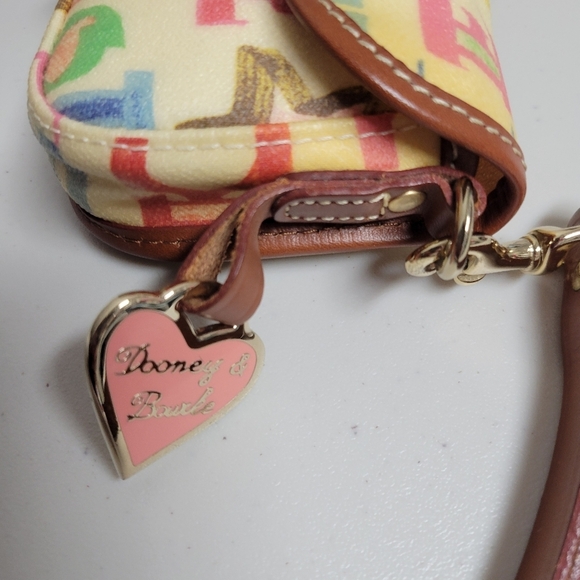 Dooney & Bourke Vintage Pouch Graffiti Canvas Leather Trim. - Picture 3 of 14